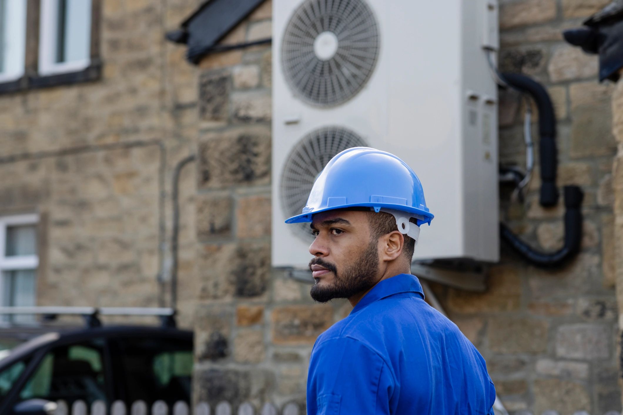 Technician supporting building systems installation