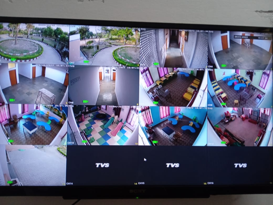 CCTV surveillance monitor showing multiple camera views at BSF Kids School near Jammu